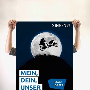 Plakatkampagne Produkteinführung TINK Plakat Hegau Hopper, Lastenrad fliegt über den Hohentwiel